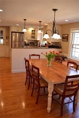 a view of a dining room with furniture