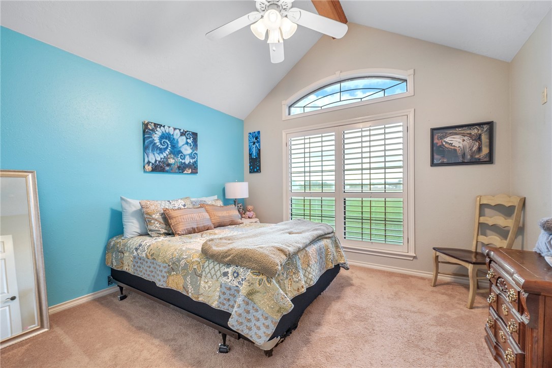 1152 McNutt Road Franklin, TX 77856 - Photo 13 of 38 a bedroom with a bed and a window