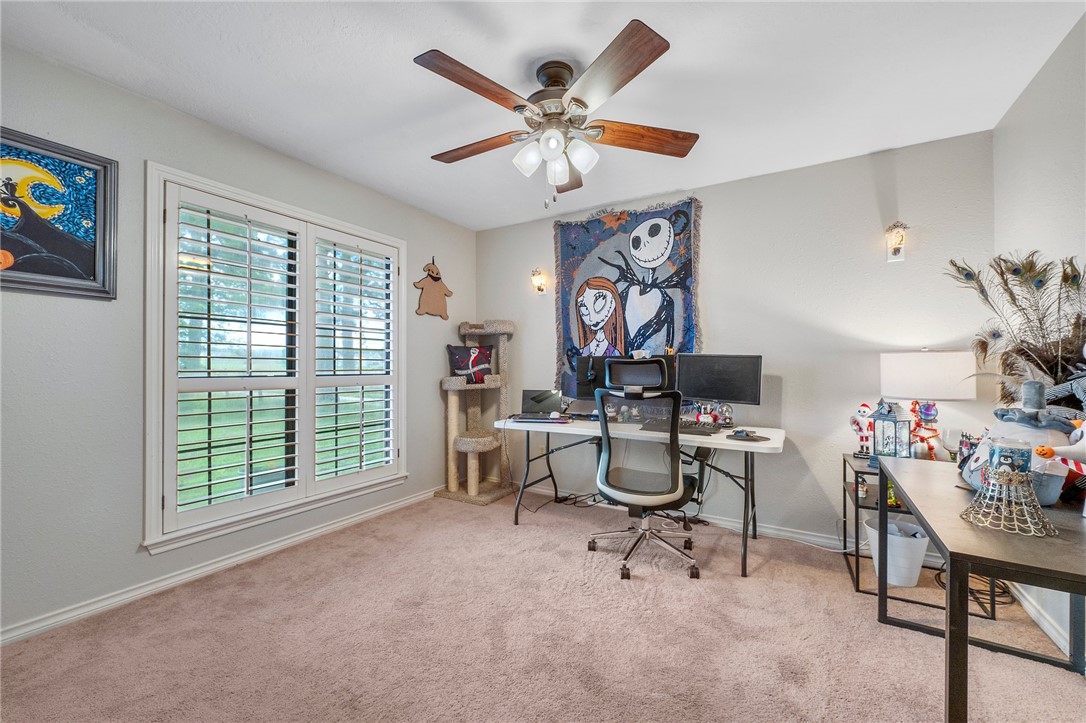1152 McNutt Road Franklin, TX 77856 - Photo 15 of 38 a work room with furniture and a large window
