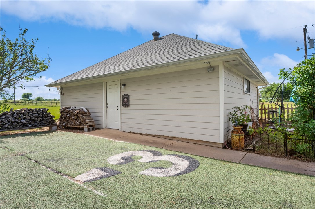 1152 McNutt Road Franklin, TX 77856 - Photo 28 of 38 a view of a house with backyard