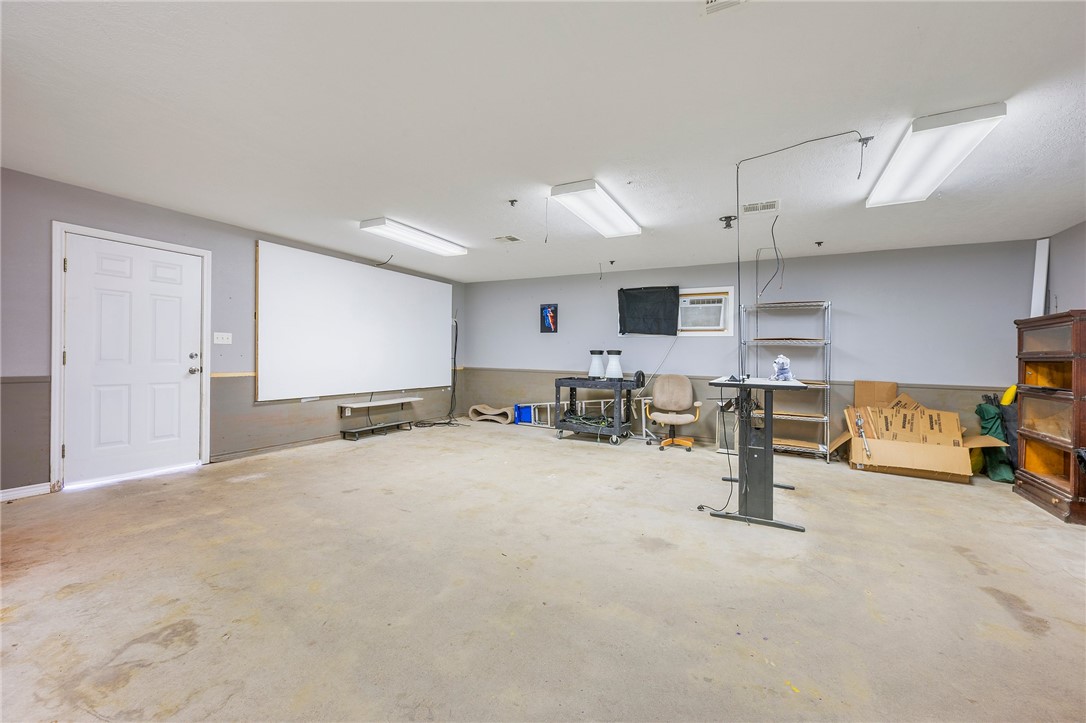 1152 McNutt Road Franklin, TX 77856 - Photo 30 of 38 a view of a livingroom with a flat screen tv