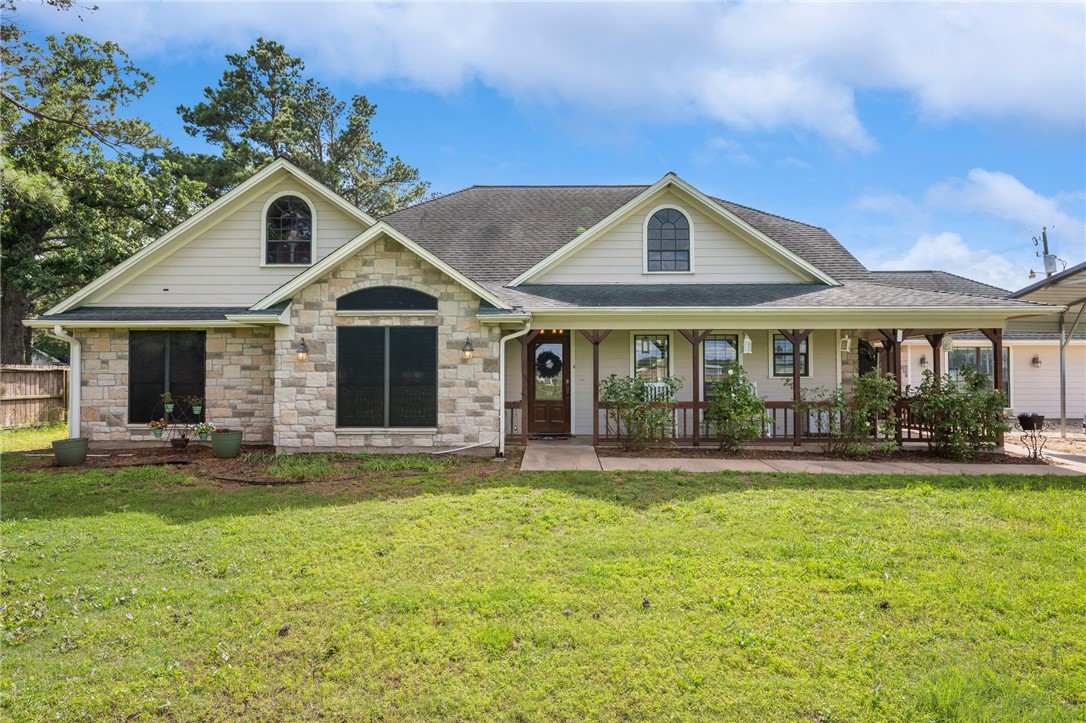 1152 McNutt Road Franklin, TX 77856 - Photo 3 of 38 a front view of a house with a yard