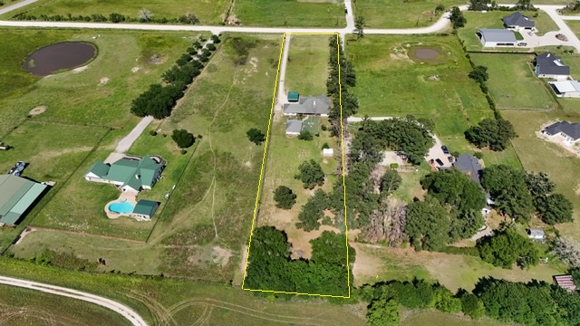 1152 McNutt Road Franklin, TX 77856 - Photo 38 of 38 an aerial view of a residential houses