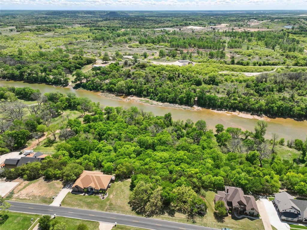 9804 Bellechase Road Granbury, TX 76049 - Photo 11 of 18 a view of a garden with an outdoor space