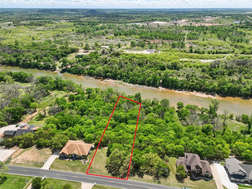 9804 Bellechase Road Granbury, TX 76049 - Photo 2 of 18 a view of a garden with an outdoor space