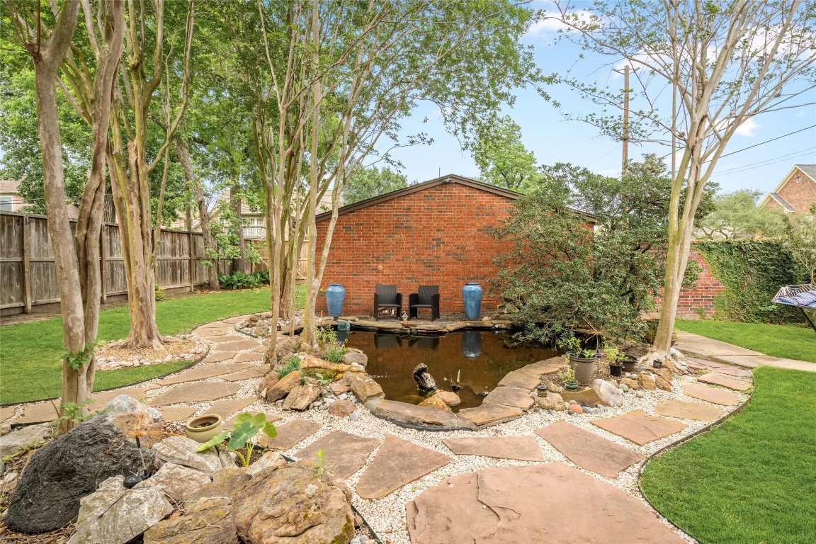 7409 South Rice Avenue Bellaire, TX 77401 - Photo 25 of 26 Escape the hustle and bustle of the city in your own private zen garden.