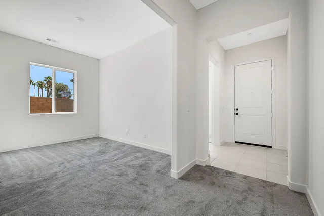 an empty room with windows