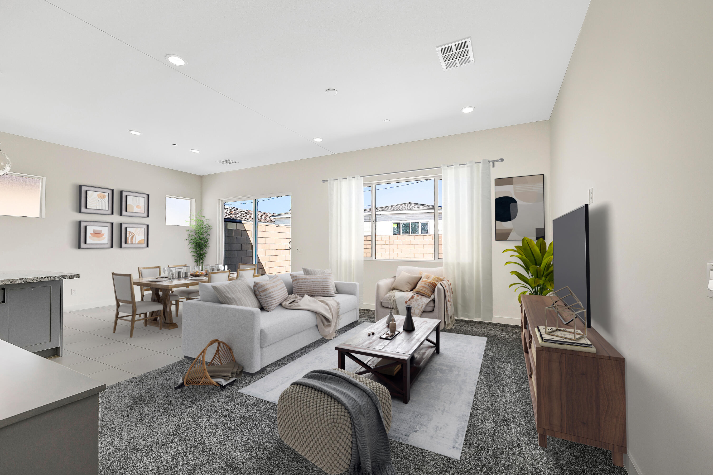 82755 Ryan Way Indio, CA 92201 - Photo 9 of 13 a living room with furniture gym equipment and a window