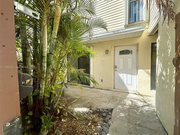 a view of a back yard of the house