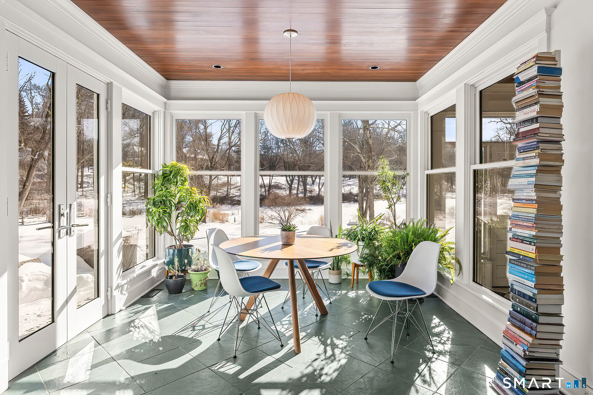 77 Golf Lane Ridgefield, CT 06877 - Photo 17 of 41 Atrium-style breakfast nook dining with view of beautiful backyard and pond.