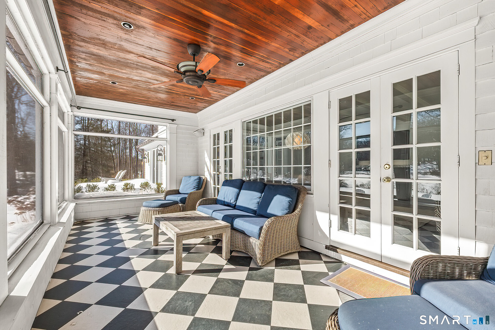 77 Golf Lane Ridgefield, CT 06877 - Photo 21 of 41 Screened in porch with views of the expansive backyard and pond.
