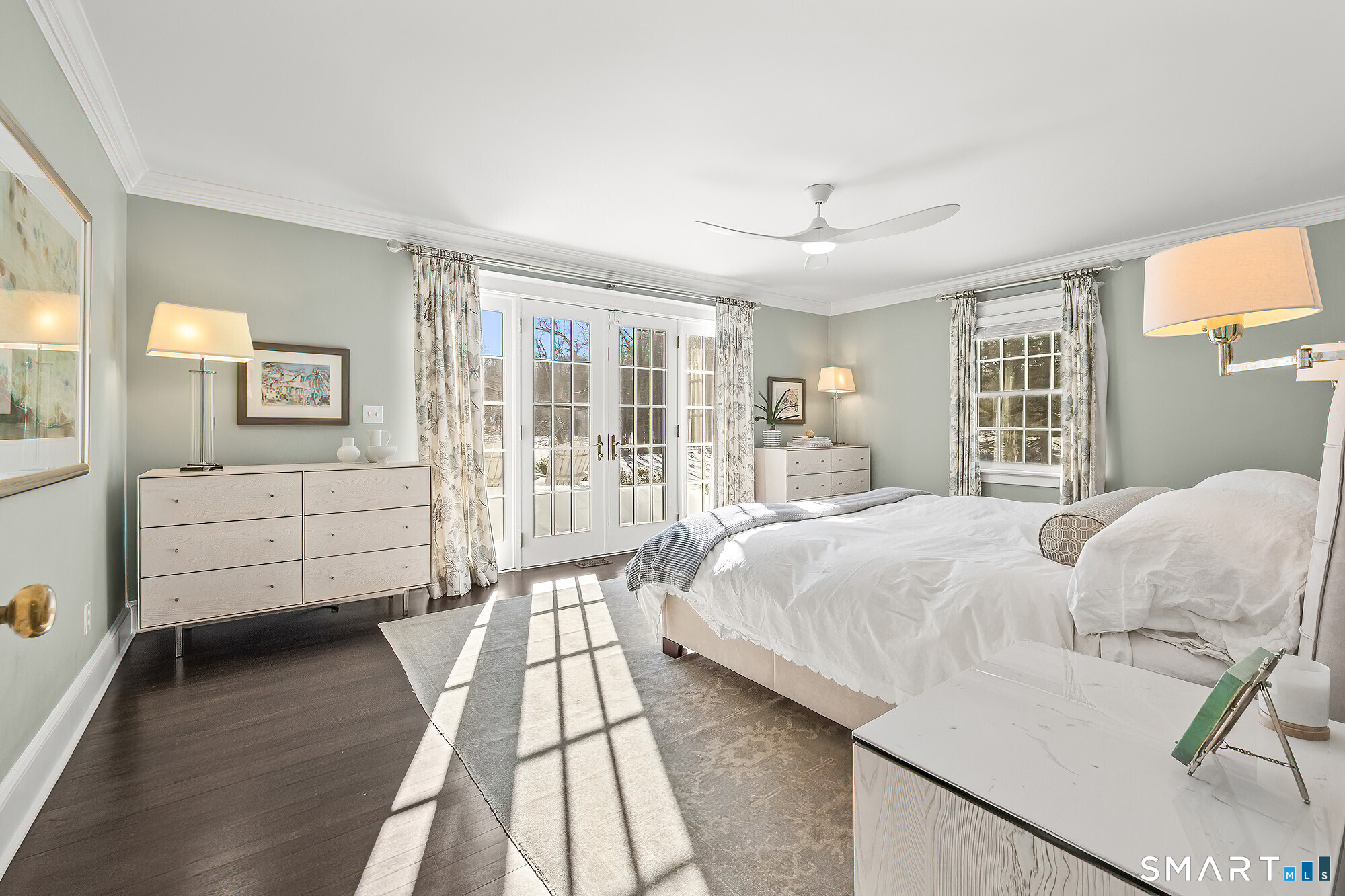 77 Golf Lane Ridgefield, CT 06877 - Photo 8 of 41 Primary bedroom with plenty of light and French doors out to patio.