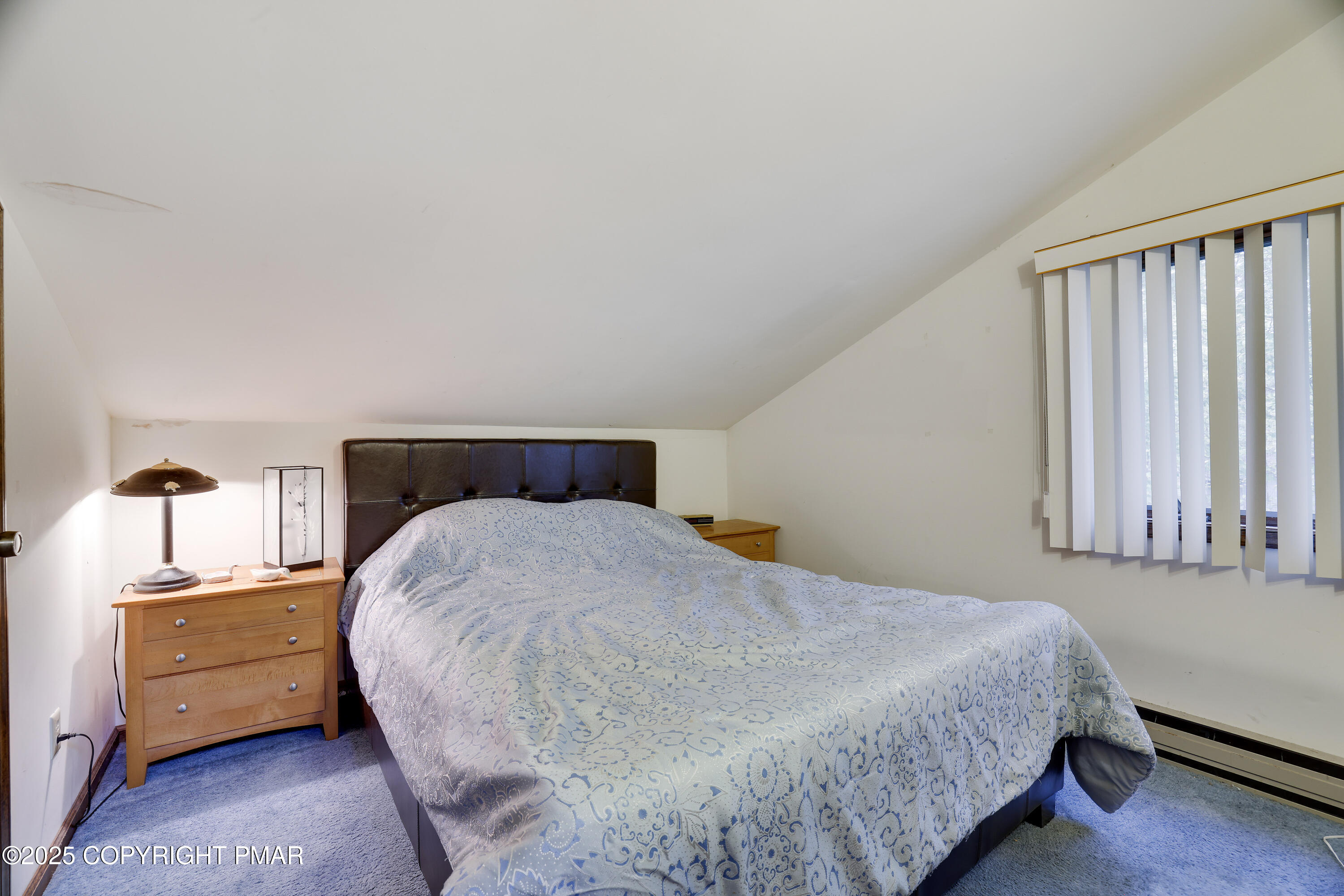 385 Saunders Drive Bushkill, PA 18324 - Photo 34 of 42 a bedroom with a bed and a closet