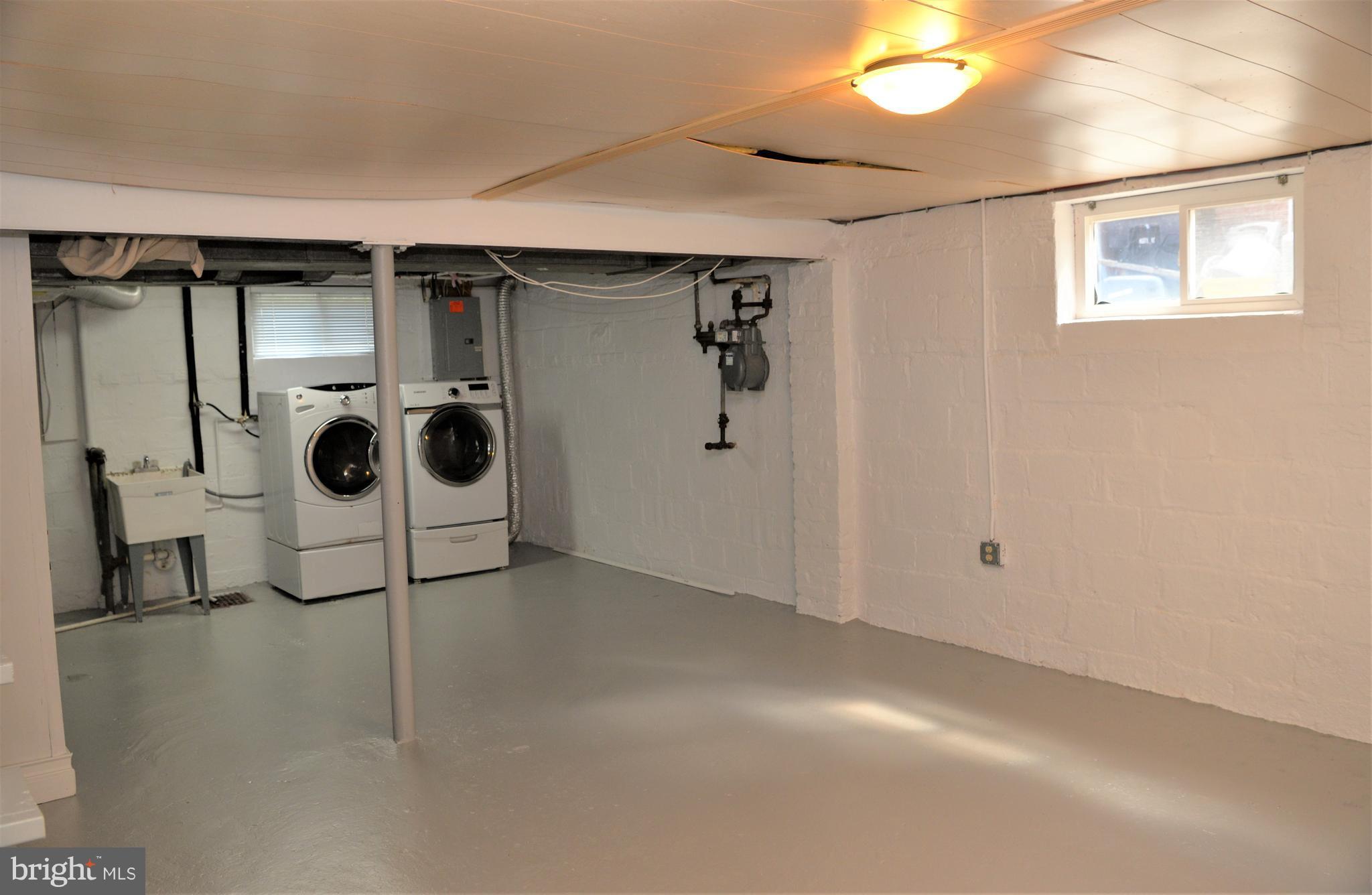 303 South Courthouse Road Arlington, VA 22204 - Photo 15 of 27 Large partially finished basement with laundry