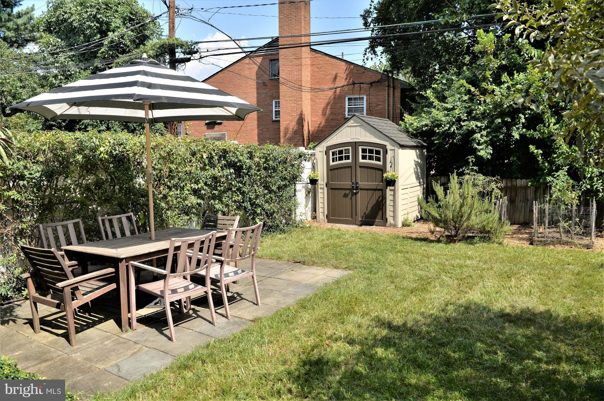 303 South Courthouse Road Arlington, VA 22204 - Photo 17 of 27 Lovely backyard with slate patio and garden shed