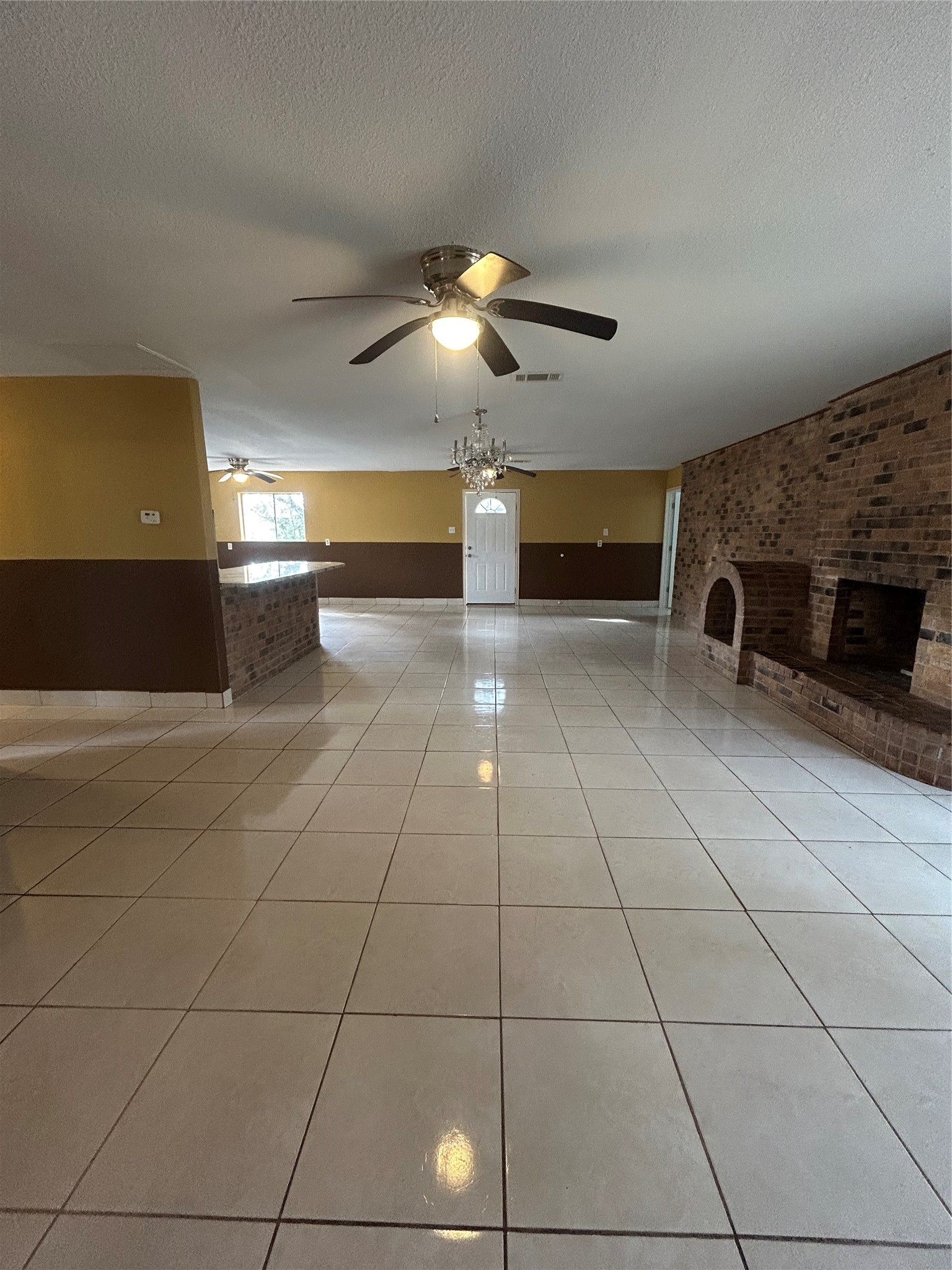 5811 East S F Austin Road Freeport, TX 77541 - Photo 16 of 26 a view of a livingroom with a fireplace