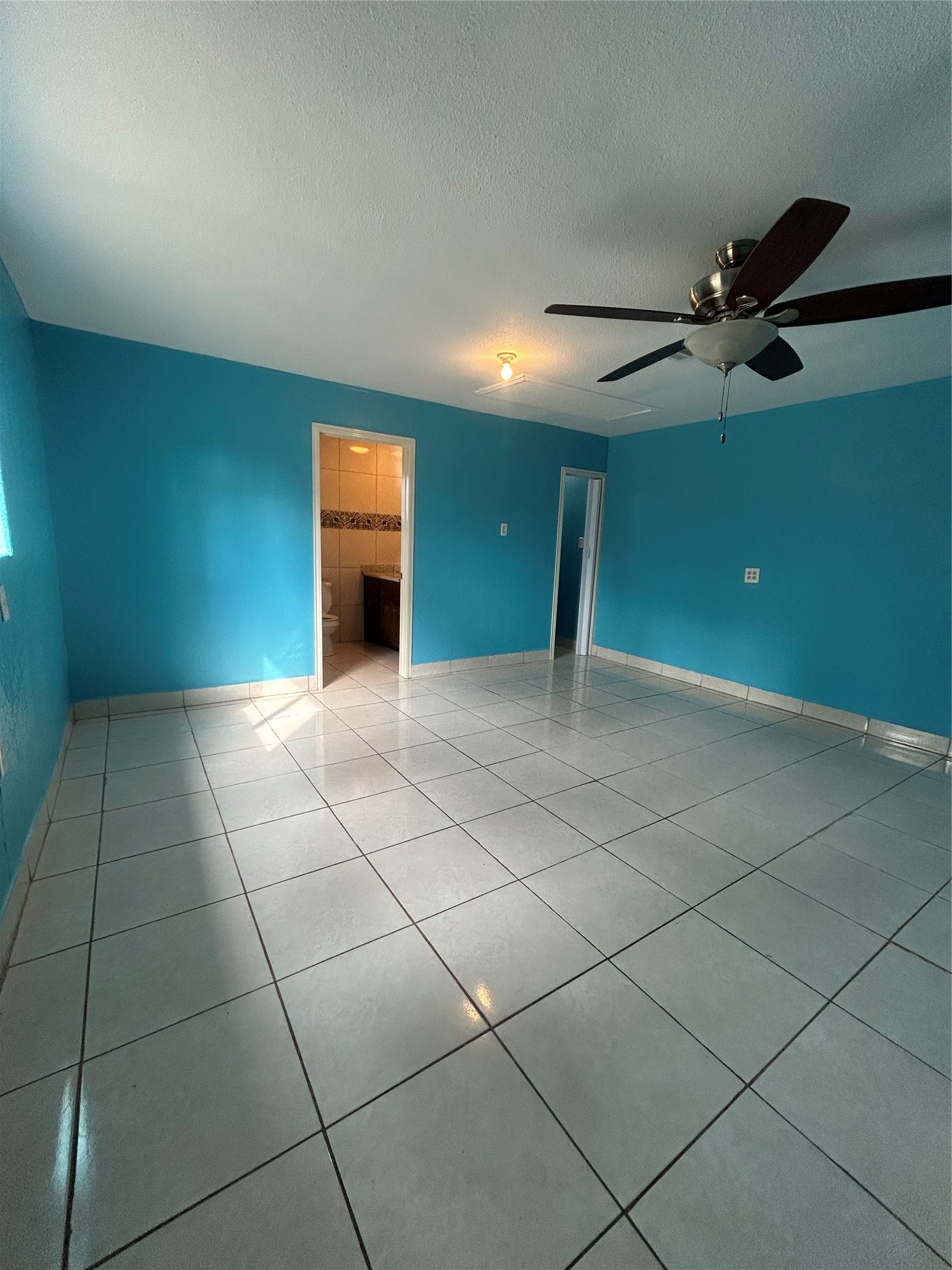 5811 East S F Austin Road Freeport, TX 77541 - Photo 17 of 26 a view of a livingroom with a fan