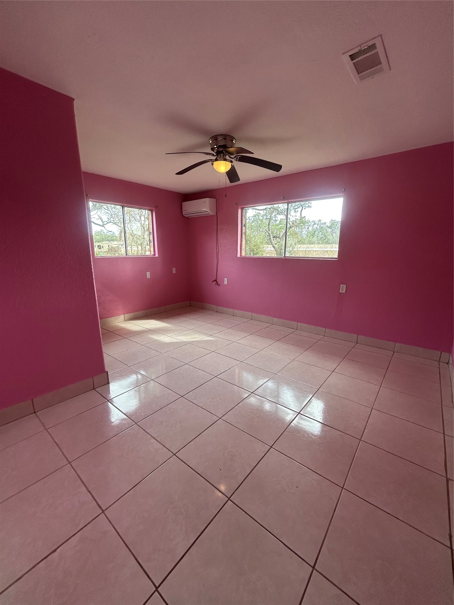 5811 East S F Austin Road Freeport, TX 77541 - Photo 22 of 26 a view of a livingroom with a window and stairs