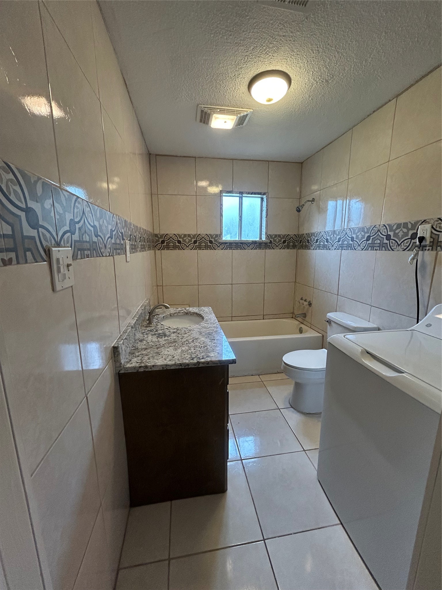 5811 East S F Austin Road Freeport, TX 77541 - Photo 24 of 26 a kitchen with a sink and cabinets