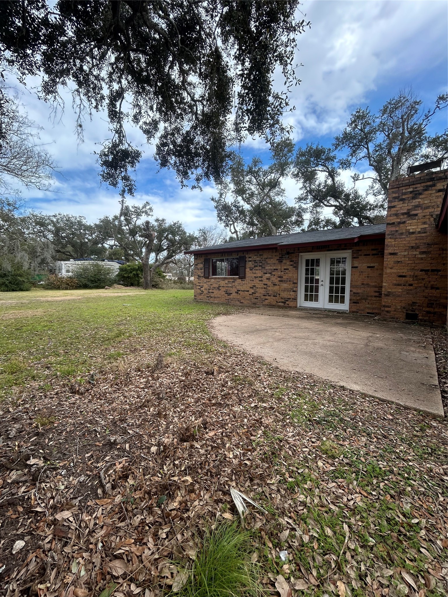 5811 East S F Austin Road Freeport, TX 77541 - Photo 6 of 26 a view of a house with a yard