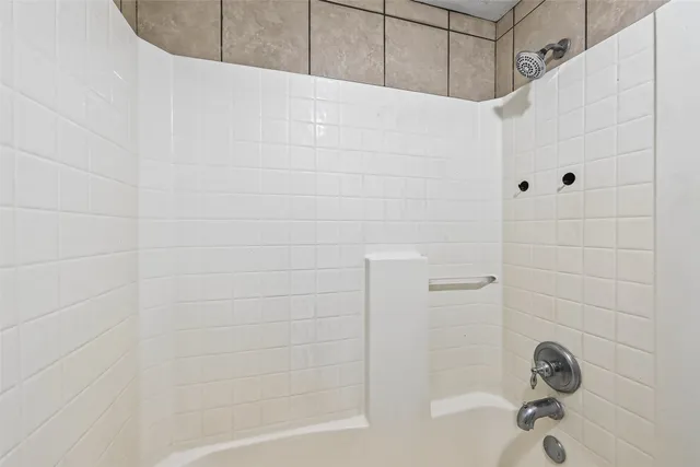 a bathroom with a bathtub