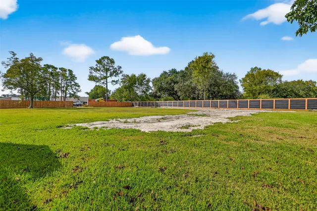 a view of a golf course with a lake