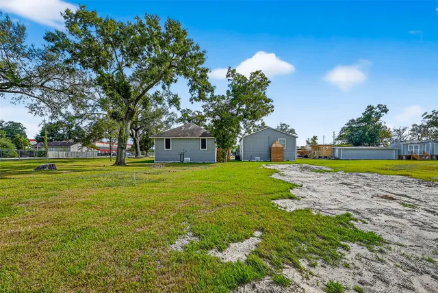 a view of a house with a big yard