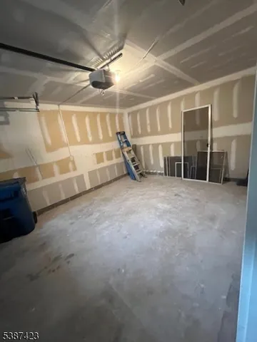 a view of an empty room with a balcony