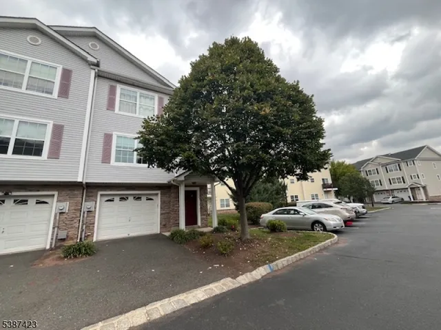 a cars parked in front of a house