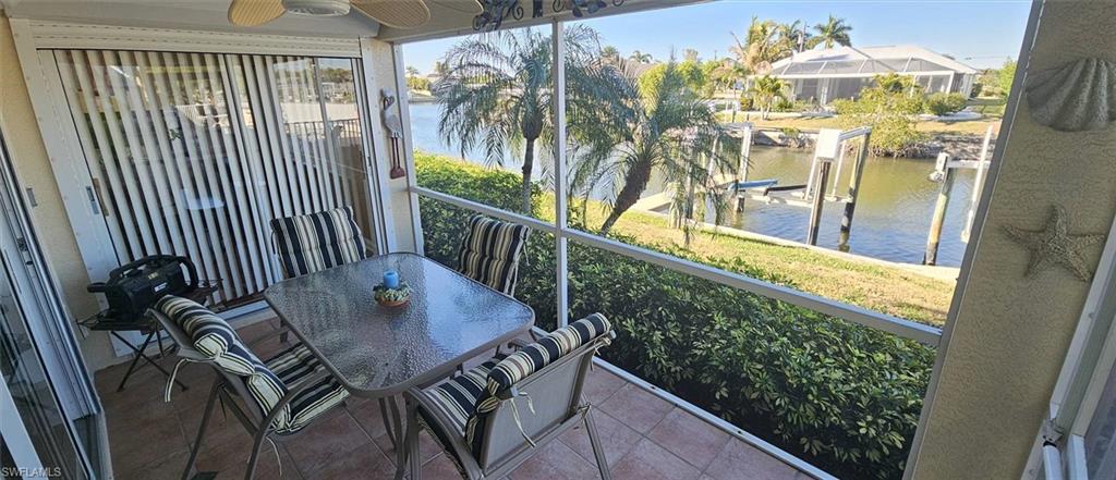 925 Southwest 47th Terrace, Unit 101 Cape Coral, FL 33914 - Photo 16 of 48 a view of a balcony dining area