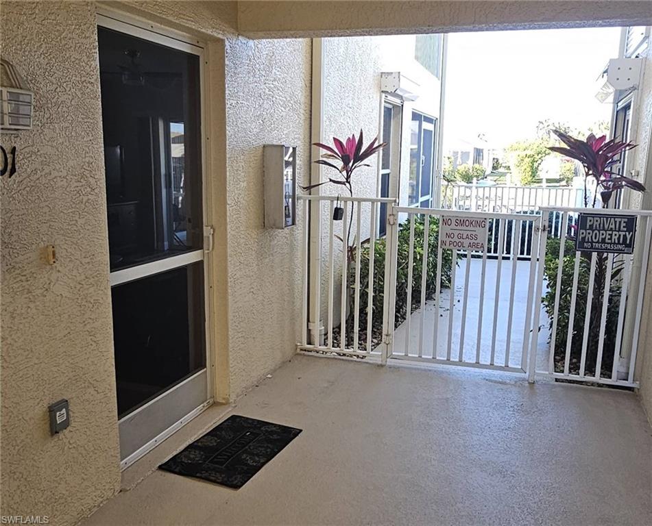 925 Southwest 47th Terrace, Unit 101 Cape Coral, FL 33914 - Photo 2 of 48 a view of a hallway with balcony
