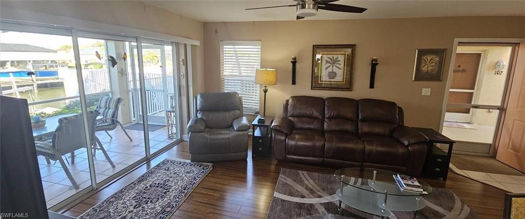 925 Southwest 47th Terrace, Unit 101 Cape Coral, FL 33914 - Photo 26 of 48 a living room with furniture