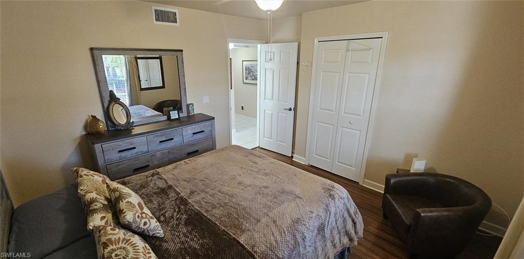 925 Southwest 47th Terrace, Unit 101 Cape Coral, FL 33914 - Photo 42 of 48 a bedroom with a bed and a window