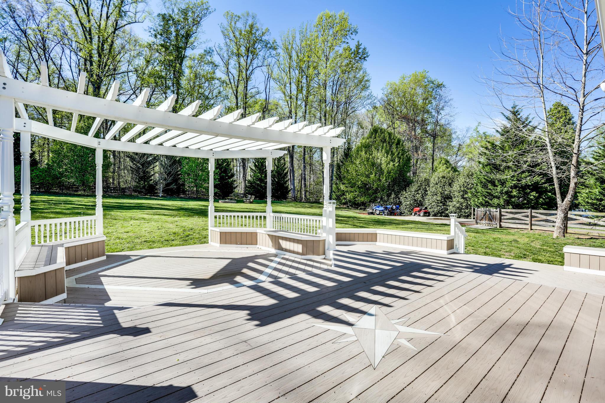 6814 North Stuart Road King George, VA 22485 - Photo 29 of 30 a view of a swimming pool with a porch