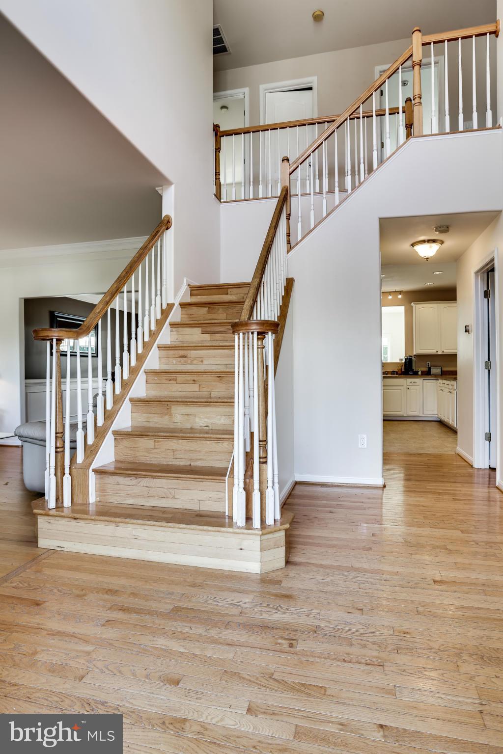 6814 North Stuart Road King George, VA 22485 - Photo 8 of 30 a view of entryway and hall with wooden floor