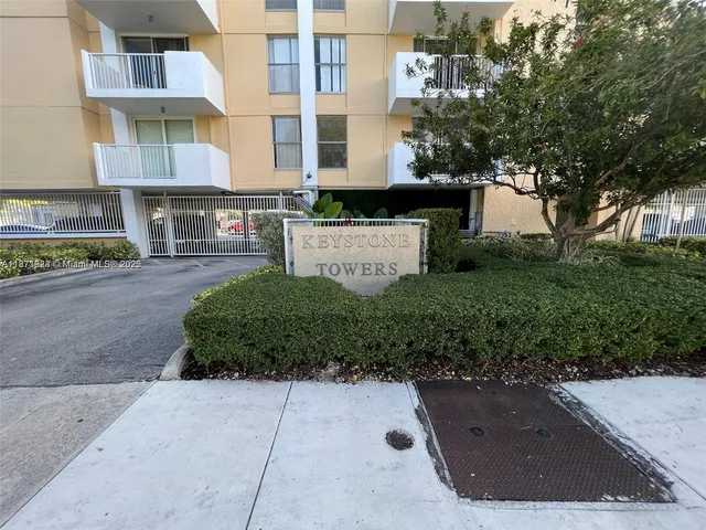a view of a street with a building