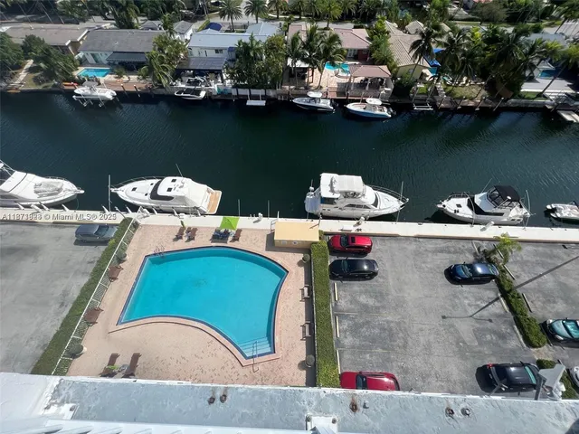 an aerial view of a house with outdoor space