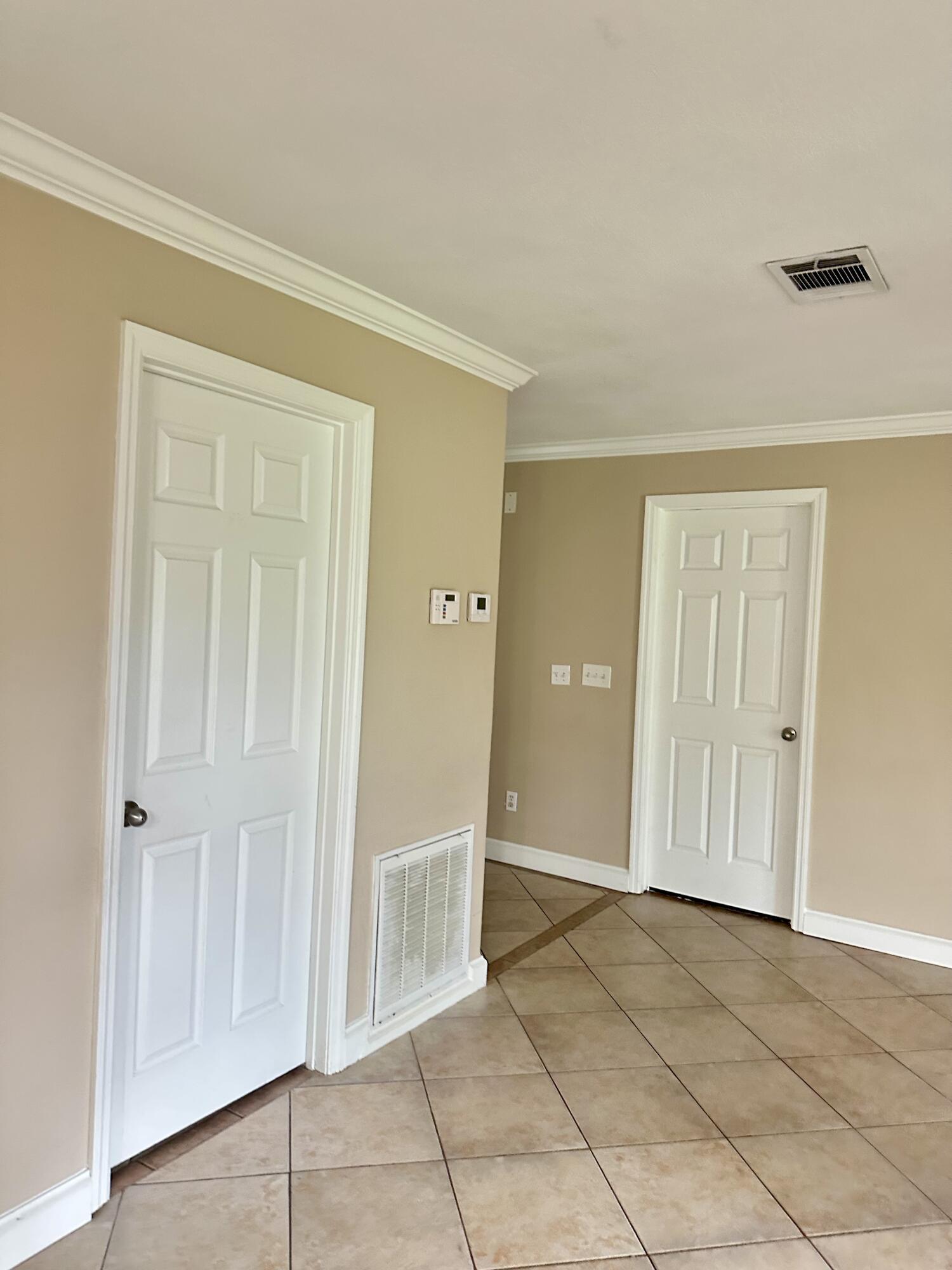 383 Southwest Tulip Boulevard Port St. Lucie, FL 34953 - Photo 10 of 26 a view of an empty room