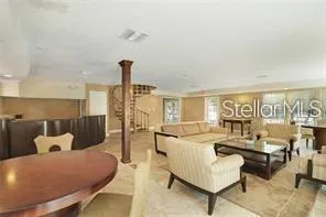 a room with furniture and window