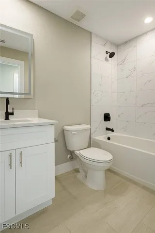 a view of a hallway with windows