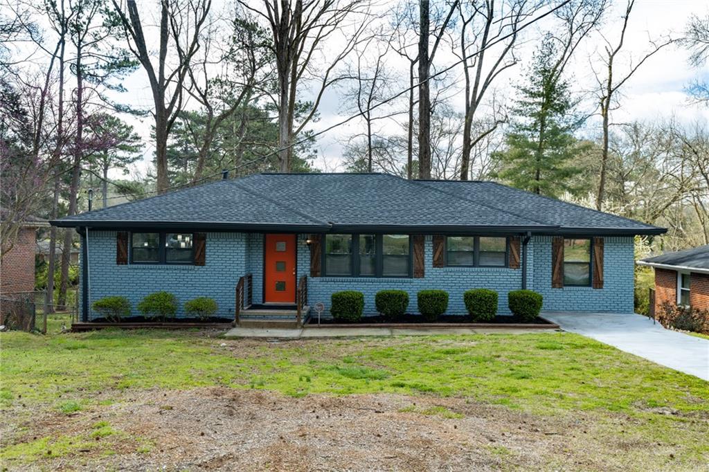 2993 Del Monico Drive Decatur, GA 30032 - Photo 1 of 1 a front view of a house with a garden