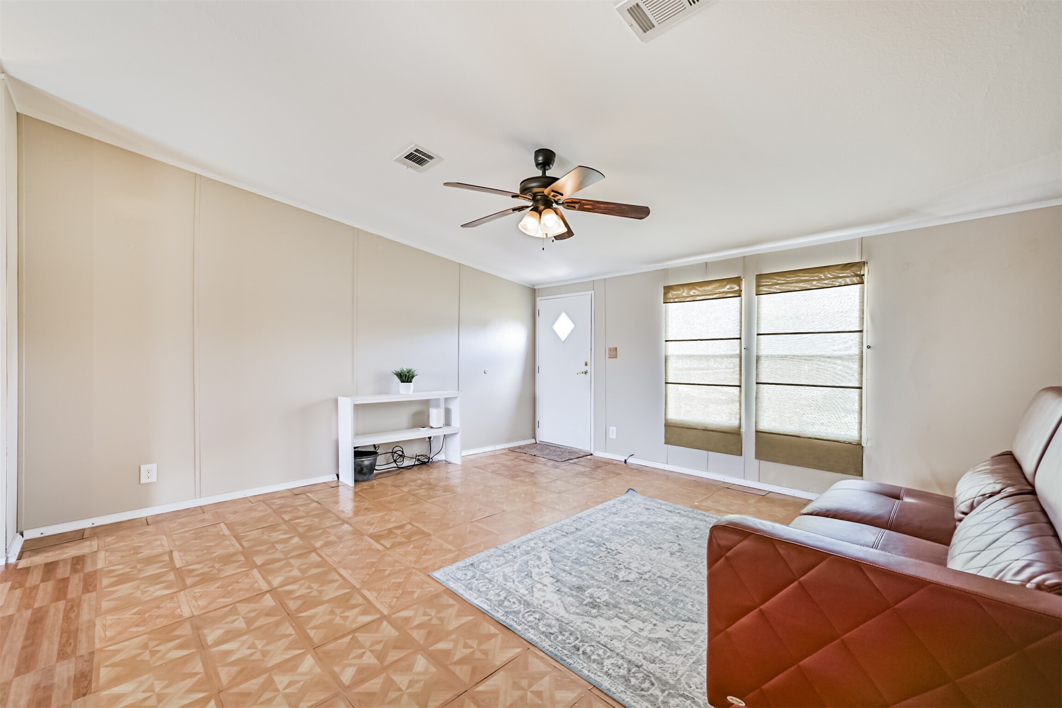 1036 9th Street Dickinson, TX 77539 - Photo 7 of 29 a living room with furniture and a window