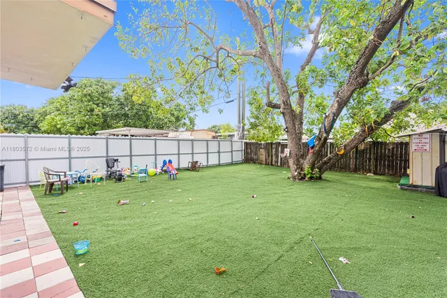 a view of a backyard with a garden