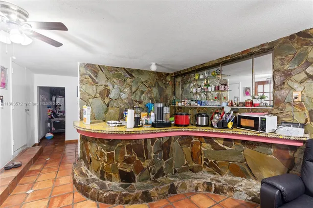 a living room with a couch and a table