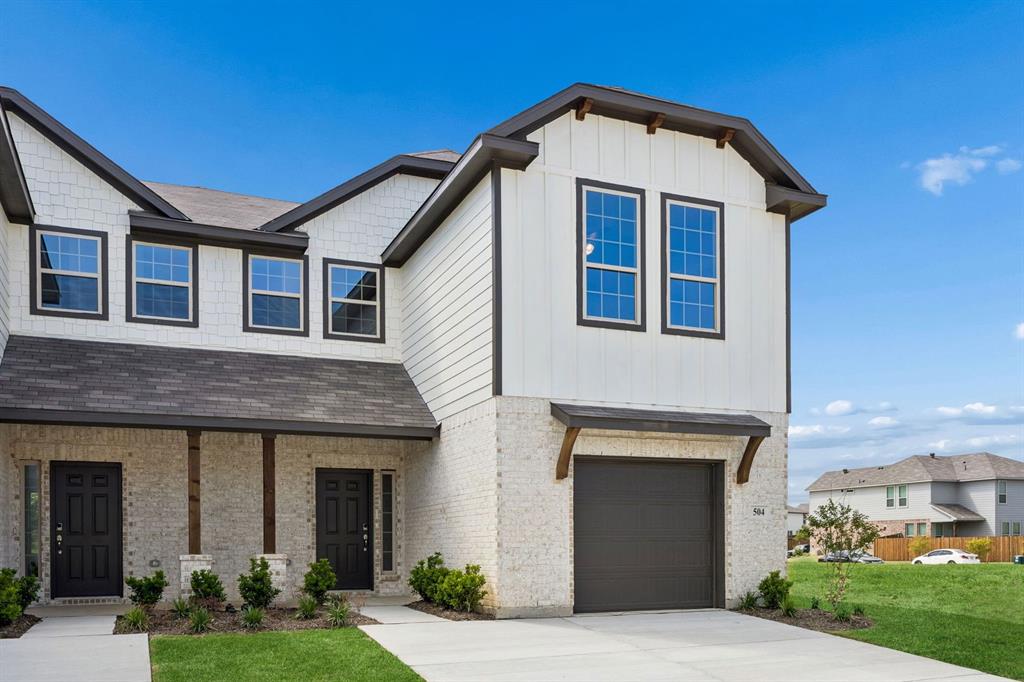 504-506 Mockingbird Lane Denton, TX 76209 - Photo 2 of 30 a front view of a house with garden