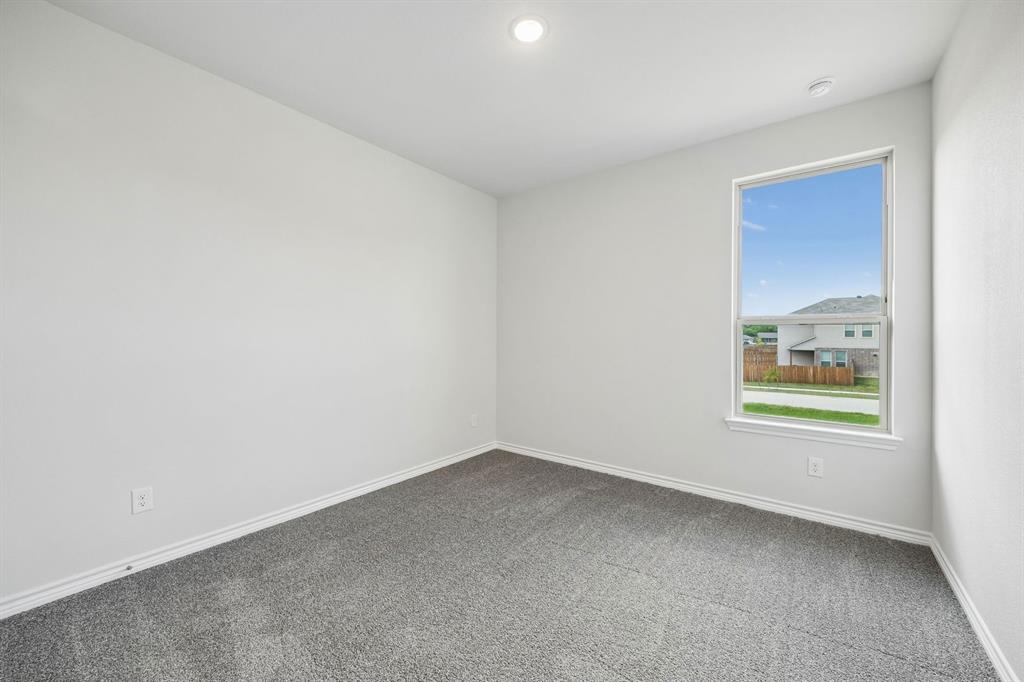 504-506 Mockingbird Lane Denton, TX 76209 - Photo 23 of 30 an empty room with a window