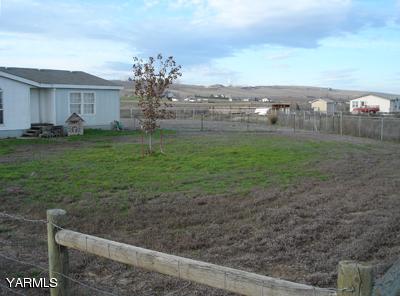 90 Outlook Road Outlook, WA 98938 - Photo 2 of 2 a view of a house with a backyard