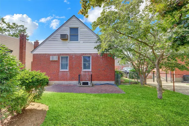 a house view with a garden space