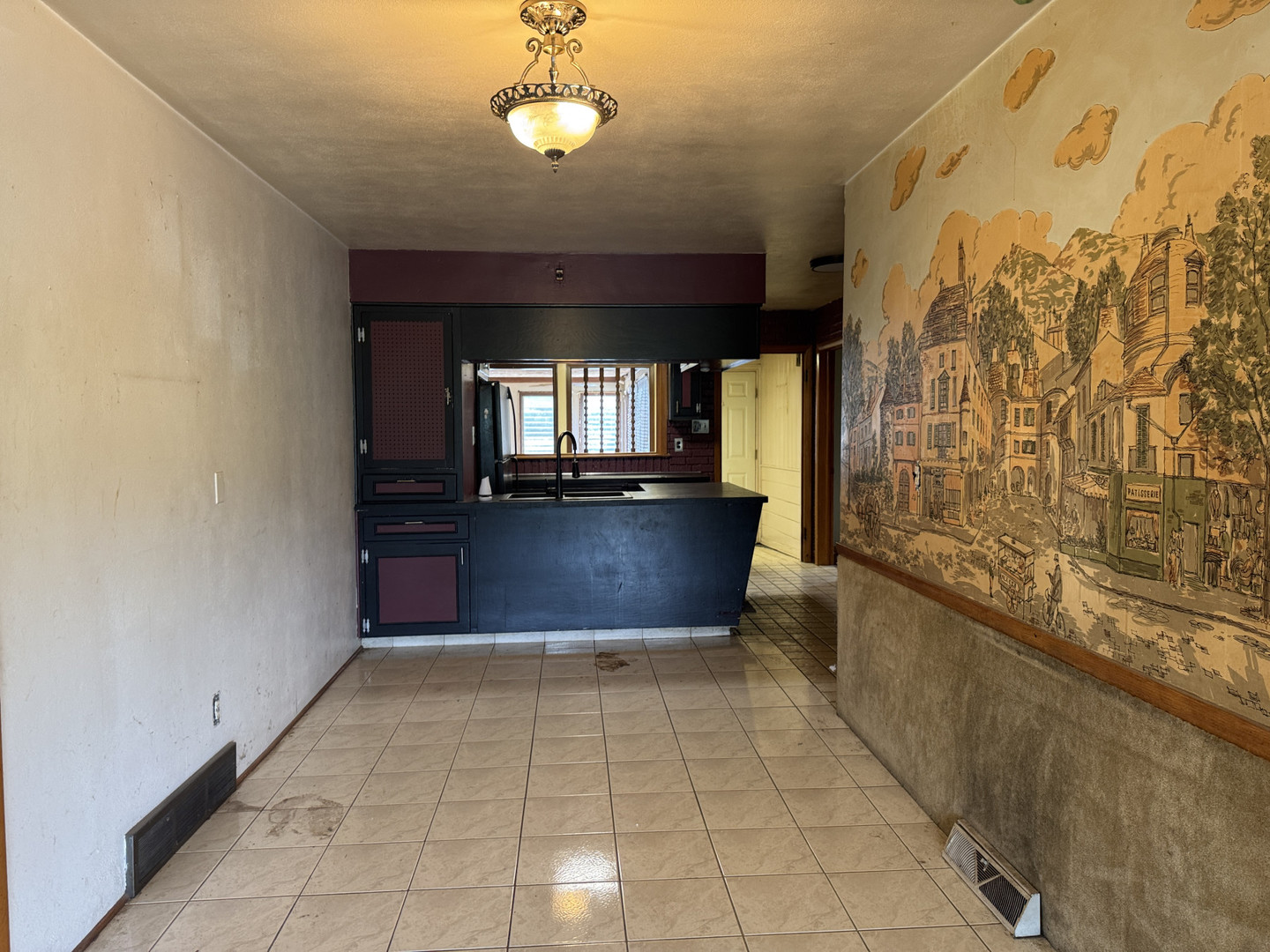 2024 Montague Road Rockford, IL 61102 - Photo 11 of 34 a view of a bathroom with a bathtub and shower