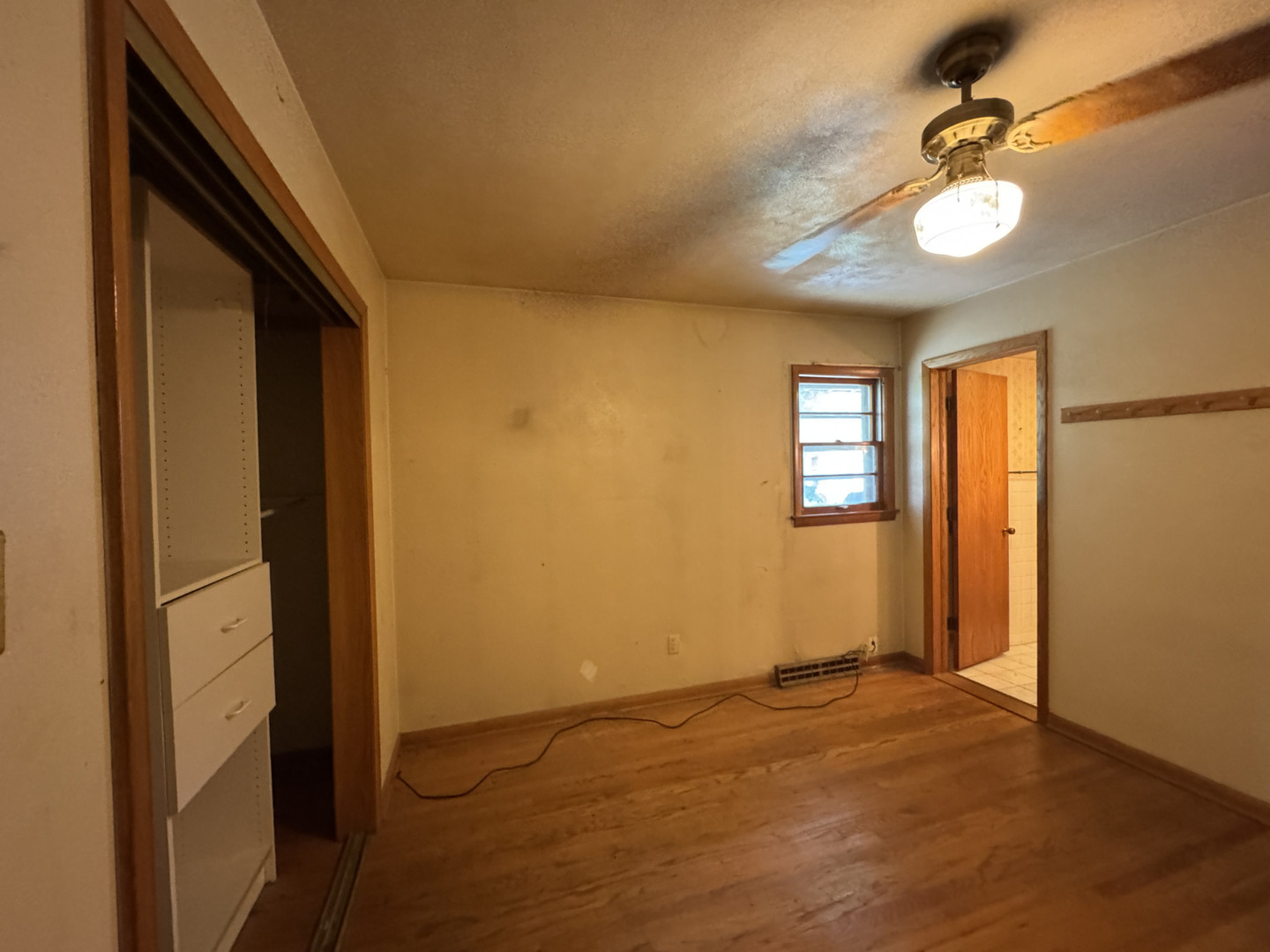 2024 Montague Road Rockford, IL 61102 - Photo 16 of 34 an empty room with windows and fan
